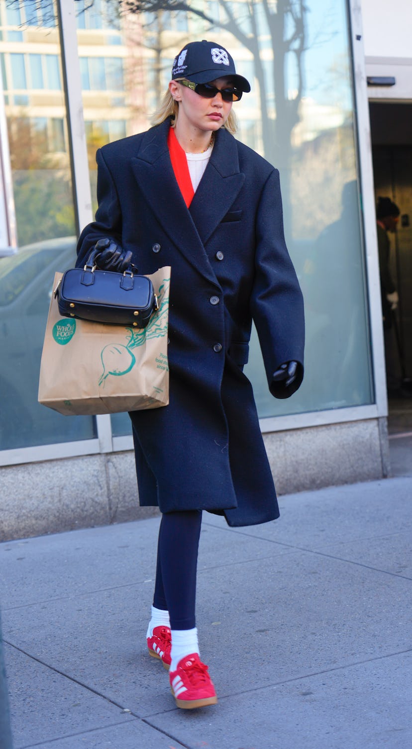 Gigi Hadid casual off-duty outfit sneakers and coat