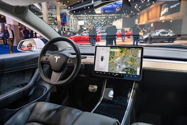 BRUSSELS, BELGIUM - JANUARY 9: Tesla Model 3 compact full electric car interior with a large touch s...