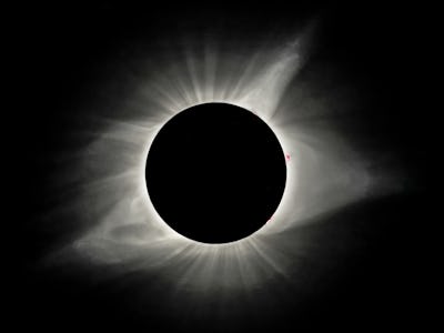 The sun's corona is visible as the moon obscures the sun during the Great American Solar Eclipse at ...