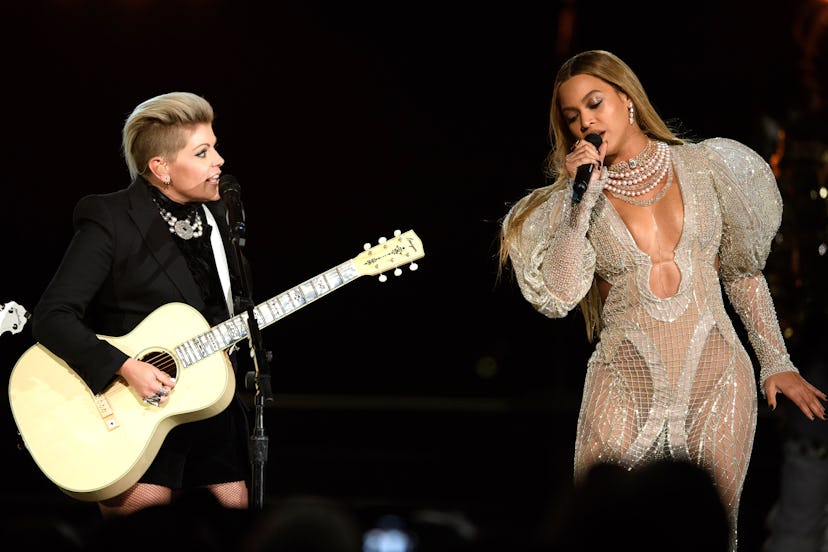 Natalie Maines and Beyoncé performing at the 2016 Country Music Awards. 