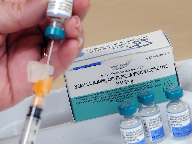 A nurse demonstrates how a measles vaccine is administered at the Orange County Health Department on...