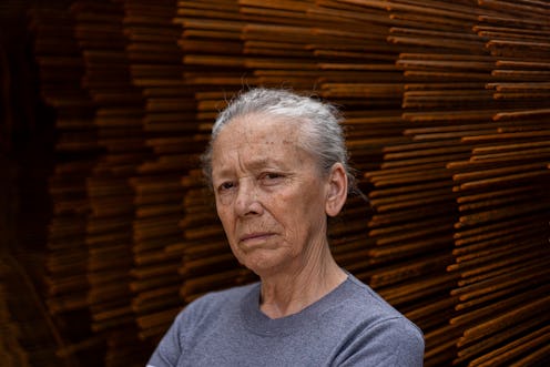 Senior woman portrait on rebar background
