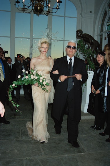 Fashion designer Karl Lagerfeld gives away supermodel Kristen McMenamy 