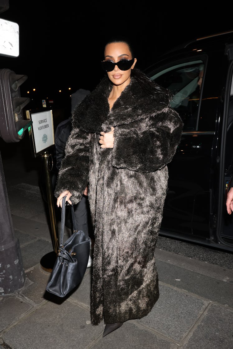 Kim Kardashian is seen arriving at a restaurant on March 03, 2024 in Paris, France.