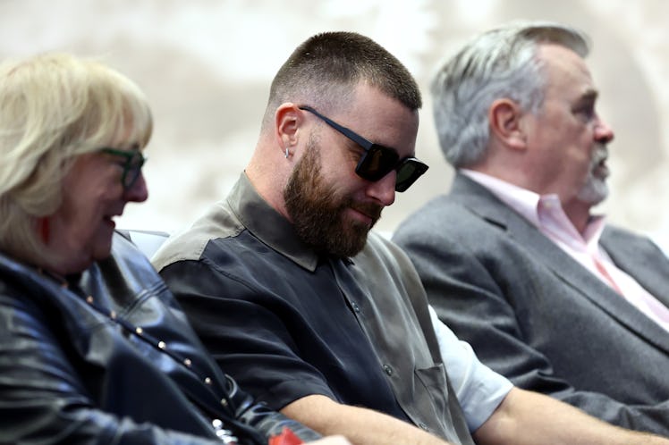 Travis Kelce wore the colors of 'Tortured Poets Department' at Jason Kelce's retirement.