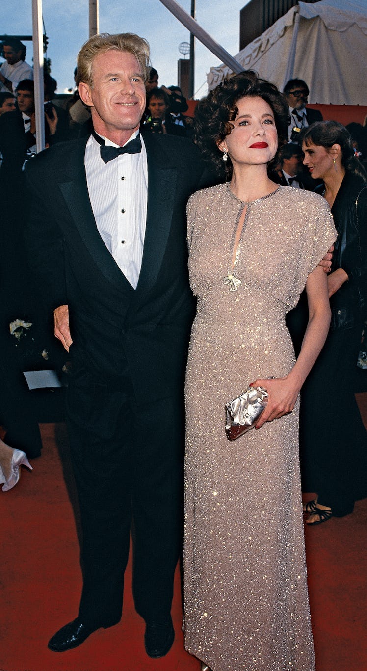 Actress Annette Bening (in Bugsy by Albert Woksky) and actor Ed Begley Jr. arrive at the 1991 Academ...