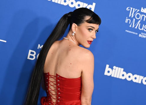 Katy Perry at Billboard Women In Music 2024 held at YouTube Theater on March 6, 2024 in a red corset...