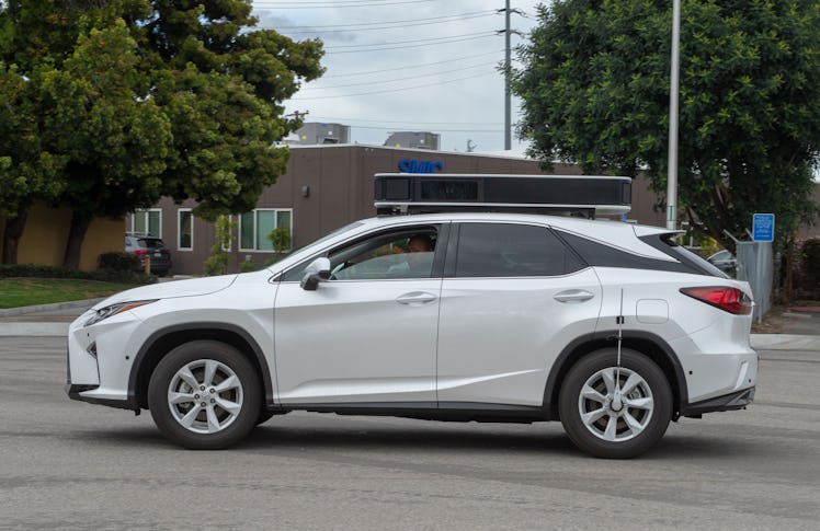 26 March 2019, US, Santa Clara: A Lexus SUV converted by Apple into a robot car is on its way on a t...