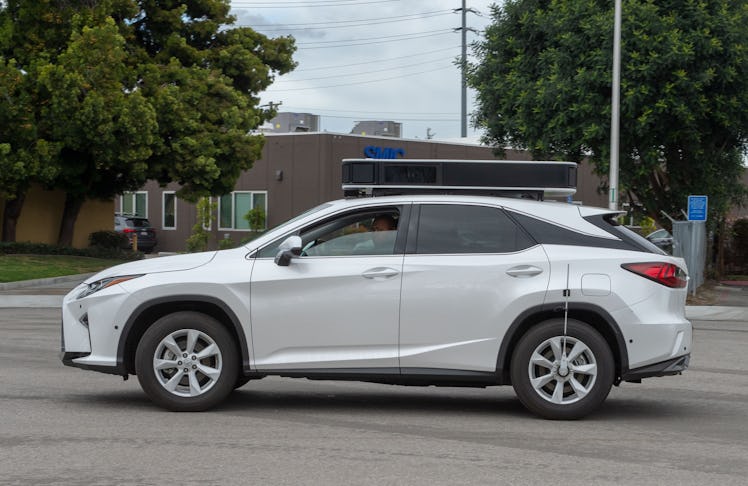 26 March 2019, US, Santa Clara: A Lexus SUV converted by Apple into a robot car is on its way on a t...