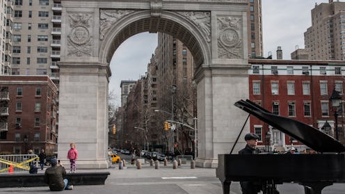 New York City, NY, USA - March 22, 2014: A pianist plays in New York City's Washington Square Park w...