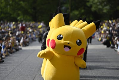 YOKOHAMA, JAPAN - AUGUST 14 : People in Pikachu costumes are seen during the Pokemon Parade in Minat...