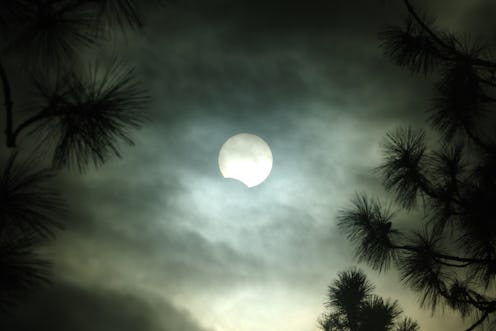 Waning phase of the October 14, 2023, annular solar eclipse through high clouds, from Chiloquin, Ore...