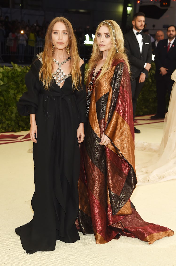 Mary-Kate Olsen and Ashley Olsen attend the Heavenly Bodies: Fashion & The Catholic Imagination 