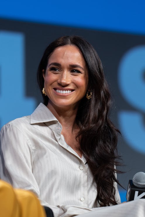 Meghan Markle ivory Heidi Merrick pleated midi dress