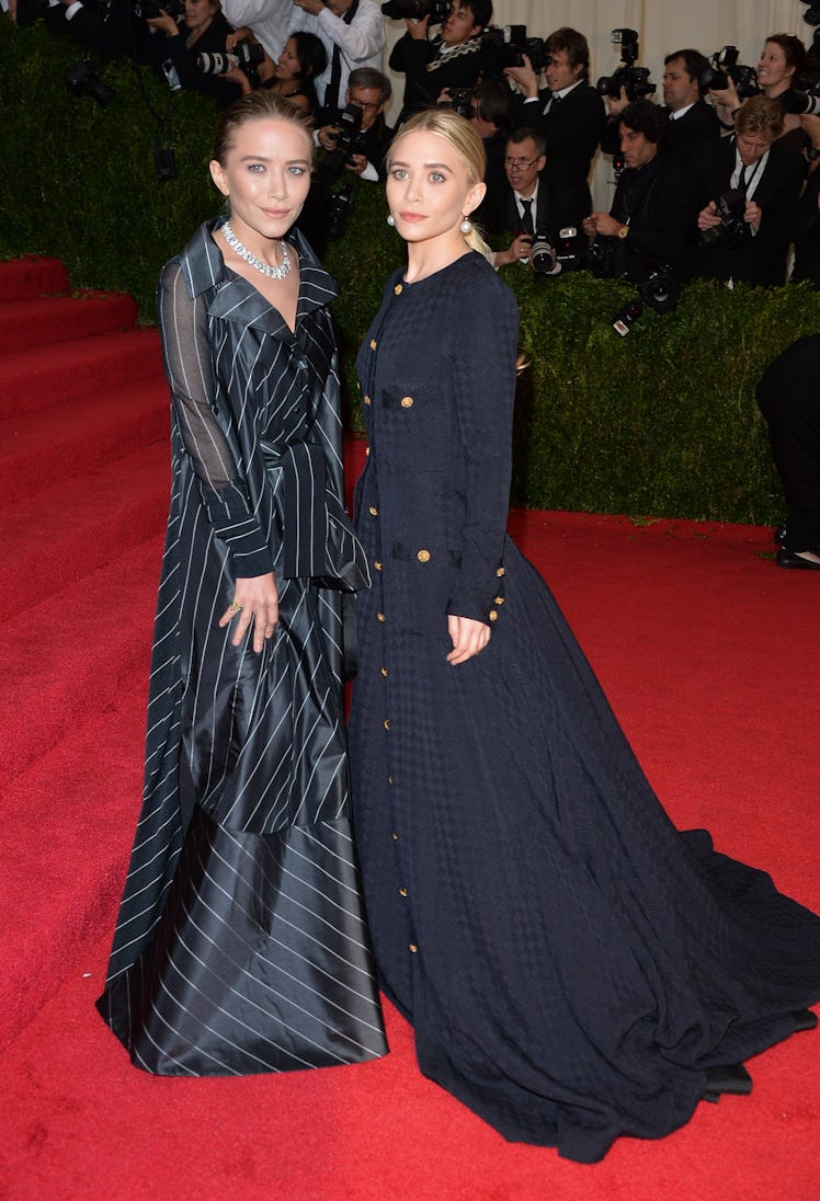 Ashley Olsen and Mary Kate Olsen attends the "Charles James: Beyond Fashion" Costume Institute Gala 