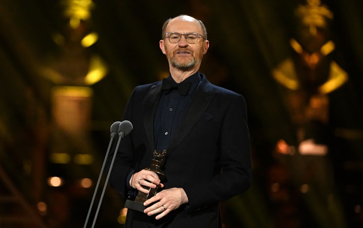 LONDON, ENGLAND - APRIL 14: Mark Gatiss with the Best Actor award on stage during The Olivier Awards...