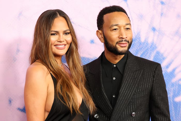 WEST HOLLYWOOD, CALIFORNIA - MARCH 06: (L-R) Chrissy Teigen and John Legend attend the 2024 Green Ca...
