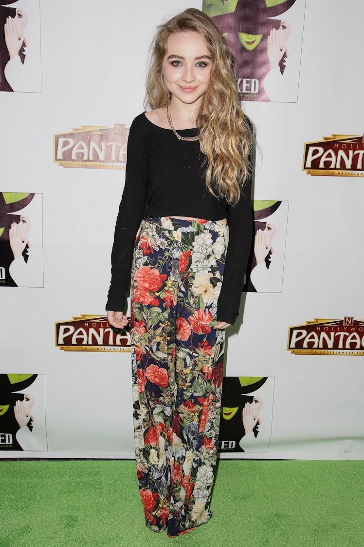 Actress Sabrina Carpenter arrives at the opening night green carpet for 'WICKED' at the Pantages The...