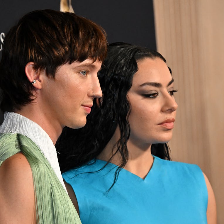 Australian singer Troye Sivan and British singer Charli XCX arrive for the Recording Academy and Cli...