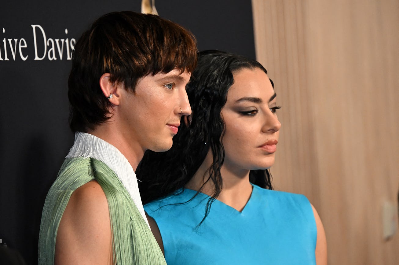 Australian singer Troye Sivan and British singer Charli XCX arrive for the Recording Academy and Cli...