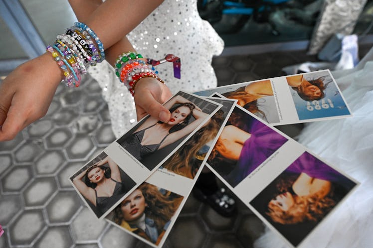 A Swiftie wears friendship bracelets, traded by superfans at Taylor Swift's Eras Tour