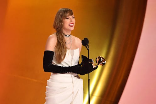 US singer-songwriter Taylor Swift accepts the Best Pop Vocal Album award for "Midnights" on stage du...