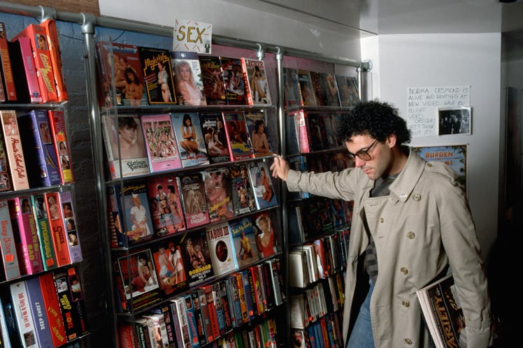 Man Looking at Porno Video Boxes (Photo by �� Jacques M. Chenet/CORBIS/Corbis via Getty Images)