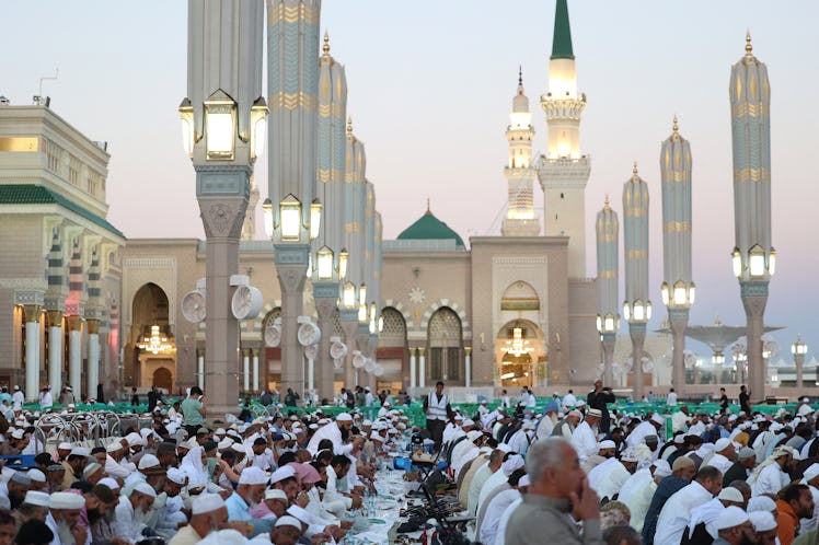 Muslim worshippers break their fast at the Al-Masjid an-Nabawi (Prophet's Mosque) in Saudi Arabia's ...