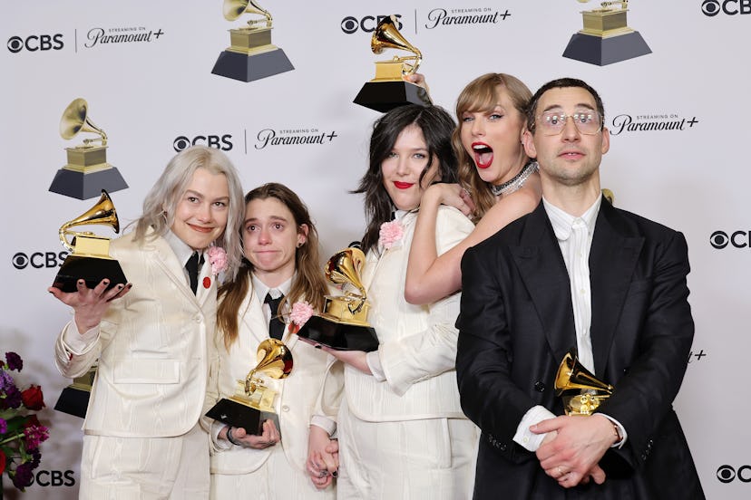 Phoebe Bridgers, Julien Baker, and Lucy Dacus of Boygenius pose with Taylor Swift and Jack Antonoff