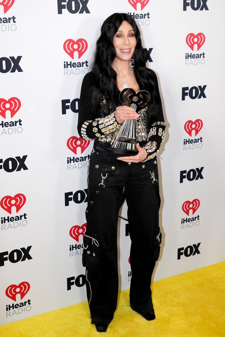Cher, winner of the Icon Award, poses in the press room during the 2024 iHeartRadio Music Awards at ...