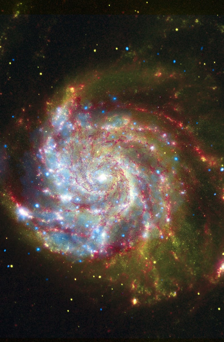 The spiral galaxy Messier 101, from composite of views from Spitzer, Hubble, and Chandra. (Photo by:...