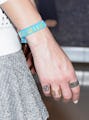 LOS ANGELES, CA - APRIL 18:  Designer Whitney Port, detail Coachella wristband, rings and tattoo, de...