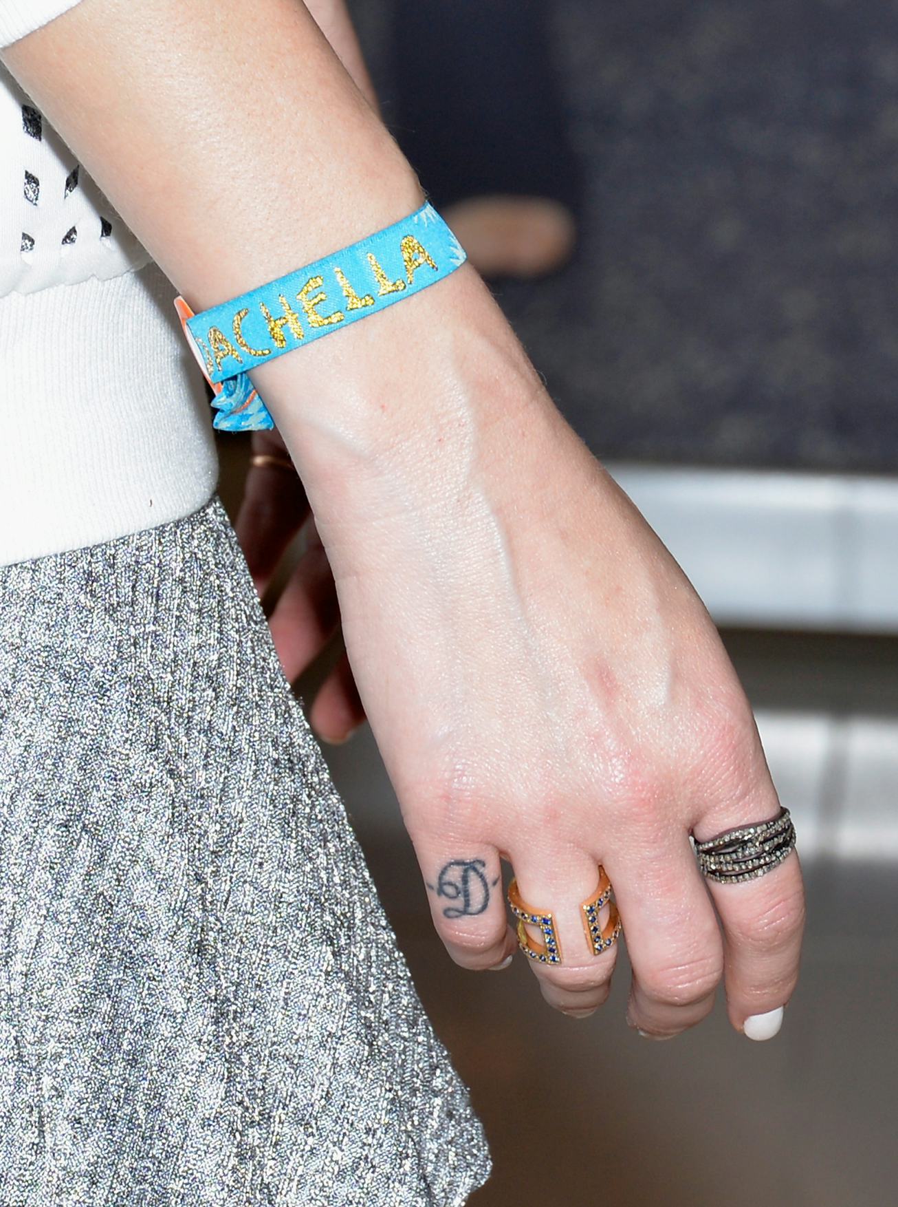 LOS ANGELES, CA - APRIL 18: Designer Whitney Port, detail Coachella wristband, rings and tattoo, de...