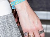 LOS ANGELES, CA - APRIL 18:  Designer Whitney Port, detail Coachella wristband, rings and tattoo, de...