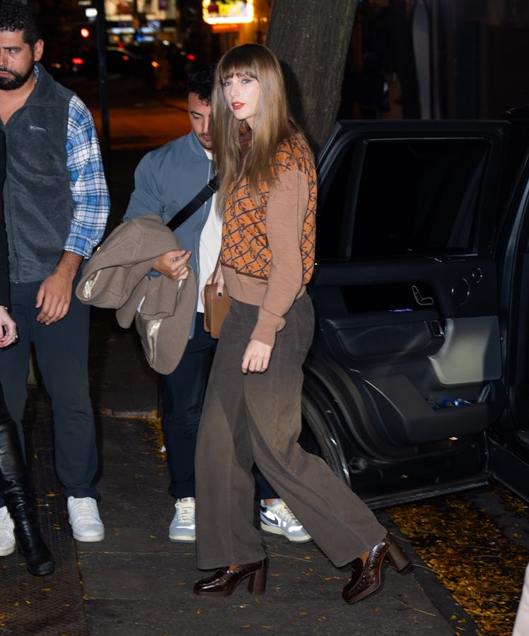 Taylor Swift was seen with an 'M' bag in NYC, which could be an easter egg to 'TTPD.'