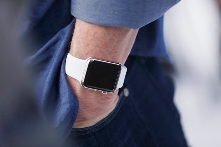 Tim Cook, Apple CEO, wears an Apple Watch on his wrist after the Apple announcement at  the Flint Ce...