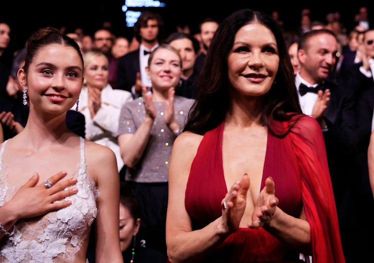 British actress Catherine Zeta-Jones (R) and her daughter Carys Zeta Douglas (L) attend the opening ...