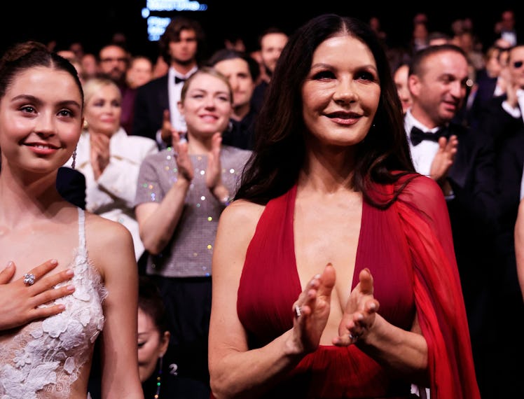 British actress Catherine Zeta-Jones (R) and her daughter Carys Zeta Douglas (L) attend the opening ...