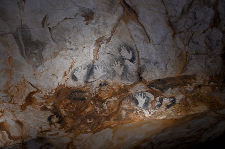 A picture taken on June 1, 2022 shows paintings in the Cosquer cave replica at the "Cosquer Mediterr...