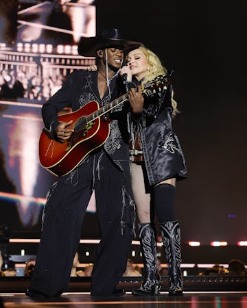 LONDON, ENGLAND - OCTOBER 15: (Exclusive Coverage) David Banda and Madonna perform during The Celebr...