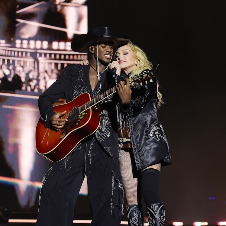 LONDON, ENGLAND - OCTOBER 15: (Exclusive Coverage) David Banda and Madonna perform during The Celebr...
