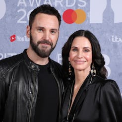 LONDON, ENGLAND - FEBRUARY 08: (EDITORIAL USE ONLY) Johnny McDaid and Courteney Cox attend The BRIT ...