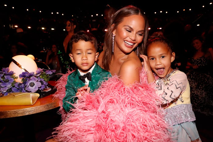 LAS VEGAS, NEVADA - APRIL 03: (L-R) Miles Stephens, Chrissy Teigen, and Luna Stephens attend the 64t...