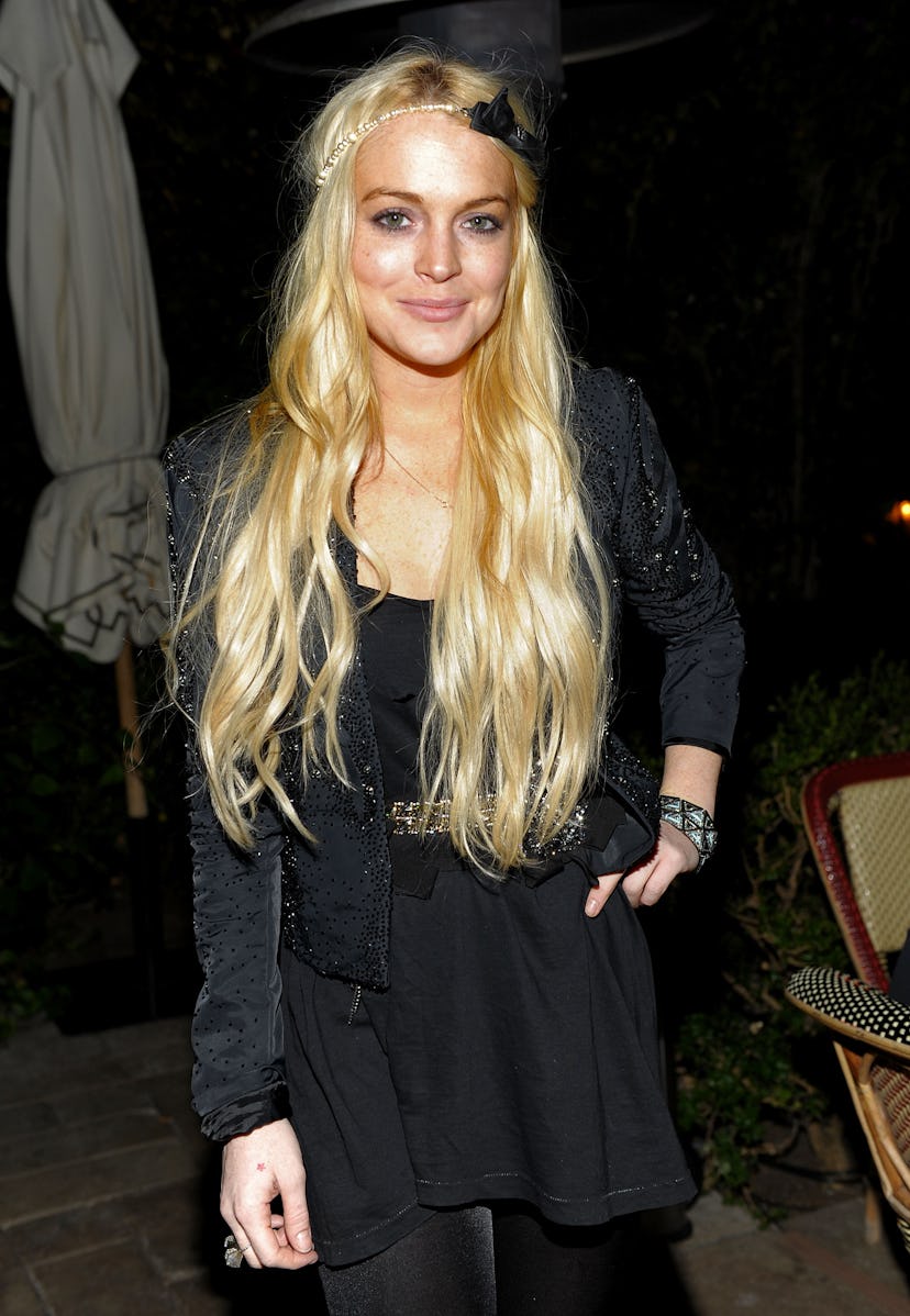 HOLLYWOOD - NOVEMBER 18:  Actress/singer Lindsay Lohan attends the GQ "Men Of The Year" party held a...