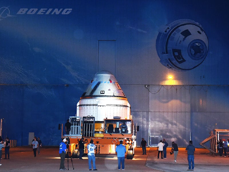 CAPE CANAVERAL, FLORIDA, UNITED STATES - APRIL 16: Boeing's CST-100 Starliner spacecraft rolls out o...
