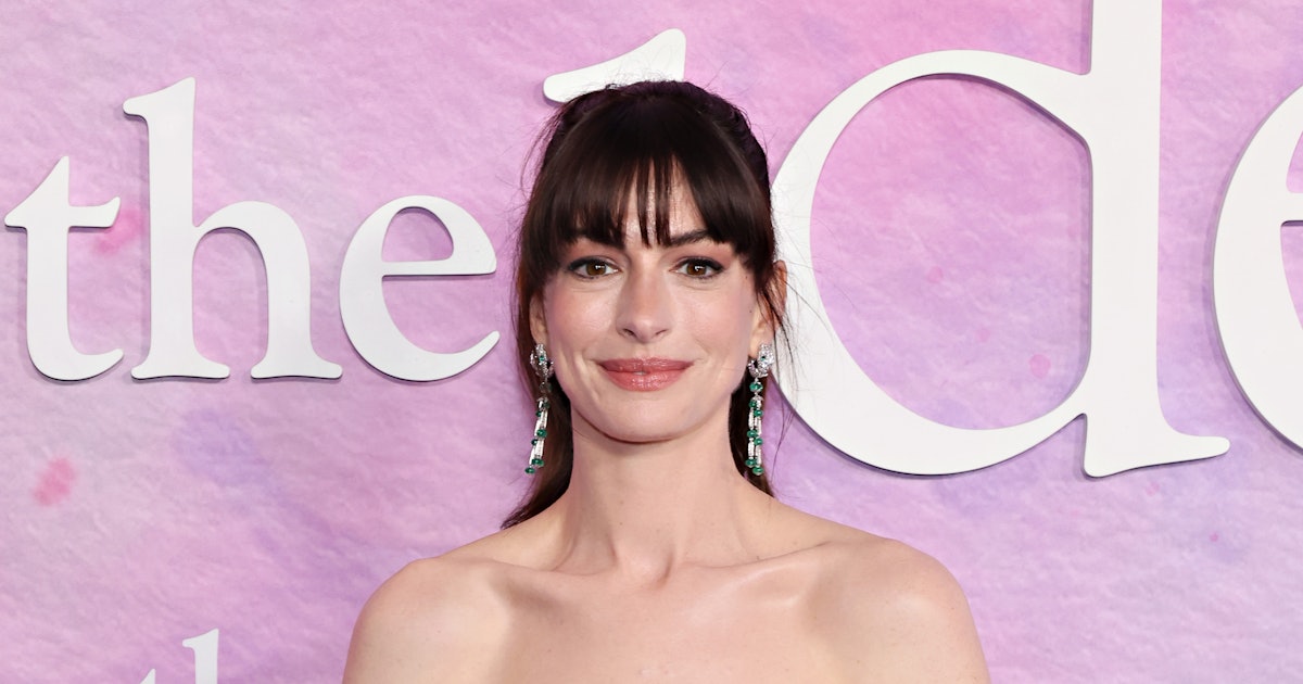 Anne Hathaway Sizzles In Cut-Out Versace For 'The Idea Of You' Premiere