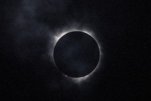The moon passes in front of the sun during a solar eclipse seen from Niagara Falls, Ontario, Canada,...