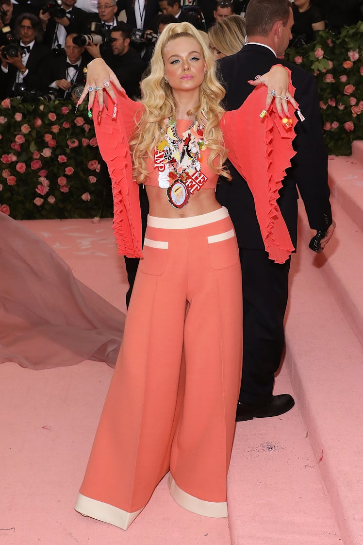 Elle Fanning attends the 2019 Met Gala celebrating "Camp: Notes on Fashion" 