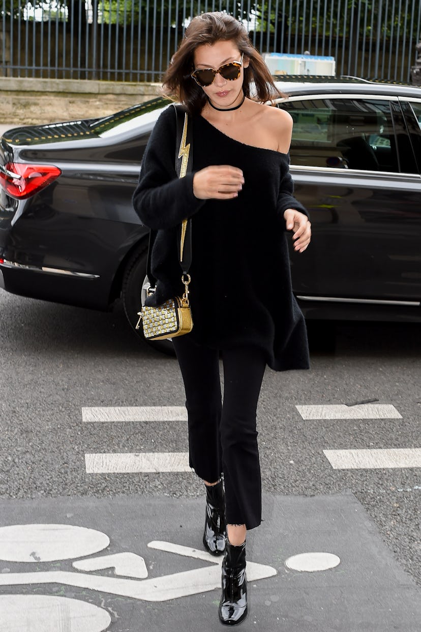 Bella Hadid carries a Marc Jacobs Snapshot bag in Paris on July 3, 2016.