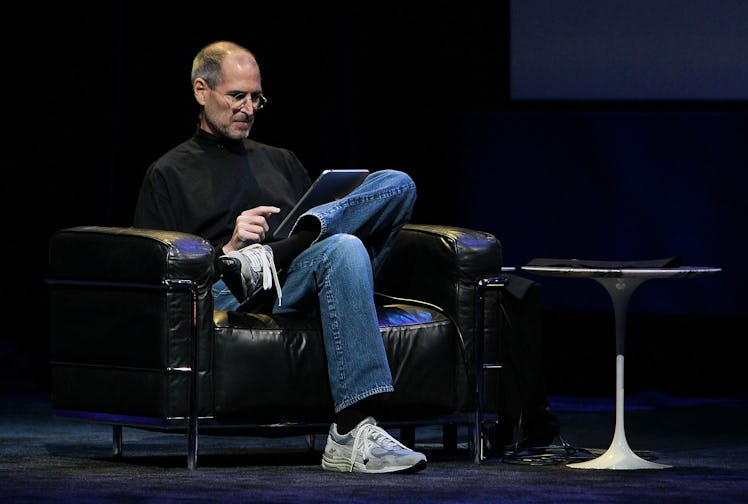 SAN FRANCISCO - JANUARY 27:  Apple Inc. CEO Steve Jobs demonstrates the new iPad as he speaks during...